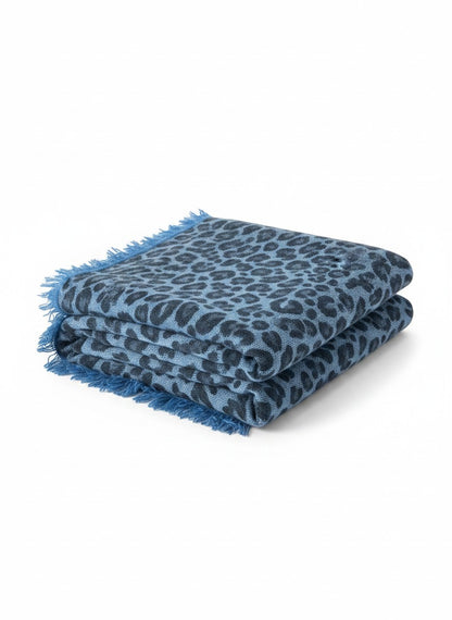 CRUMPET blue cashmere leopard print square scarf with fringe detail.