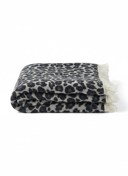 CRUMPET 100% cashmere square scarf with an ice leopard print and fringed edges. Grey and black.